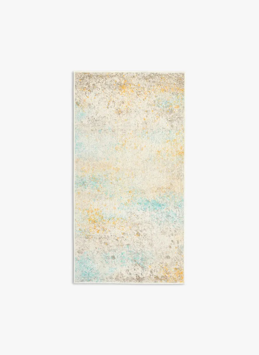 Tappeto Fioralys bouclé 3D 80×150 cm con sfumature avorio, sabbia, grigio chiaro, senape e turchese visto dall’alto.