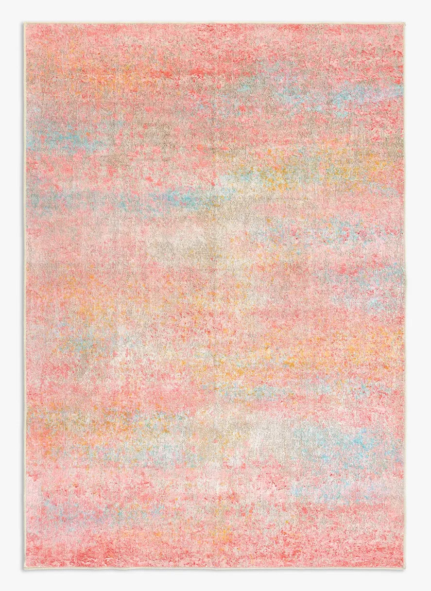 Tappeto Fiorith bouclé 3D 160×230 cm con sfumature rosa corallo, azzurro, senape e avorio visto dall’alto.