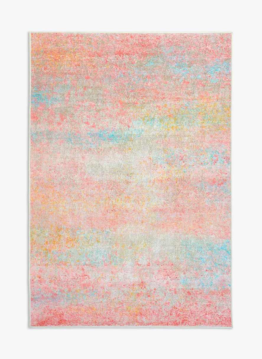 Tappeto Fiorith bouclé 3D 130×190 cm con sfumature rosa corallo, azzurro, senape e avorio visto dall’alto.