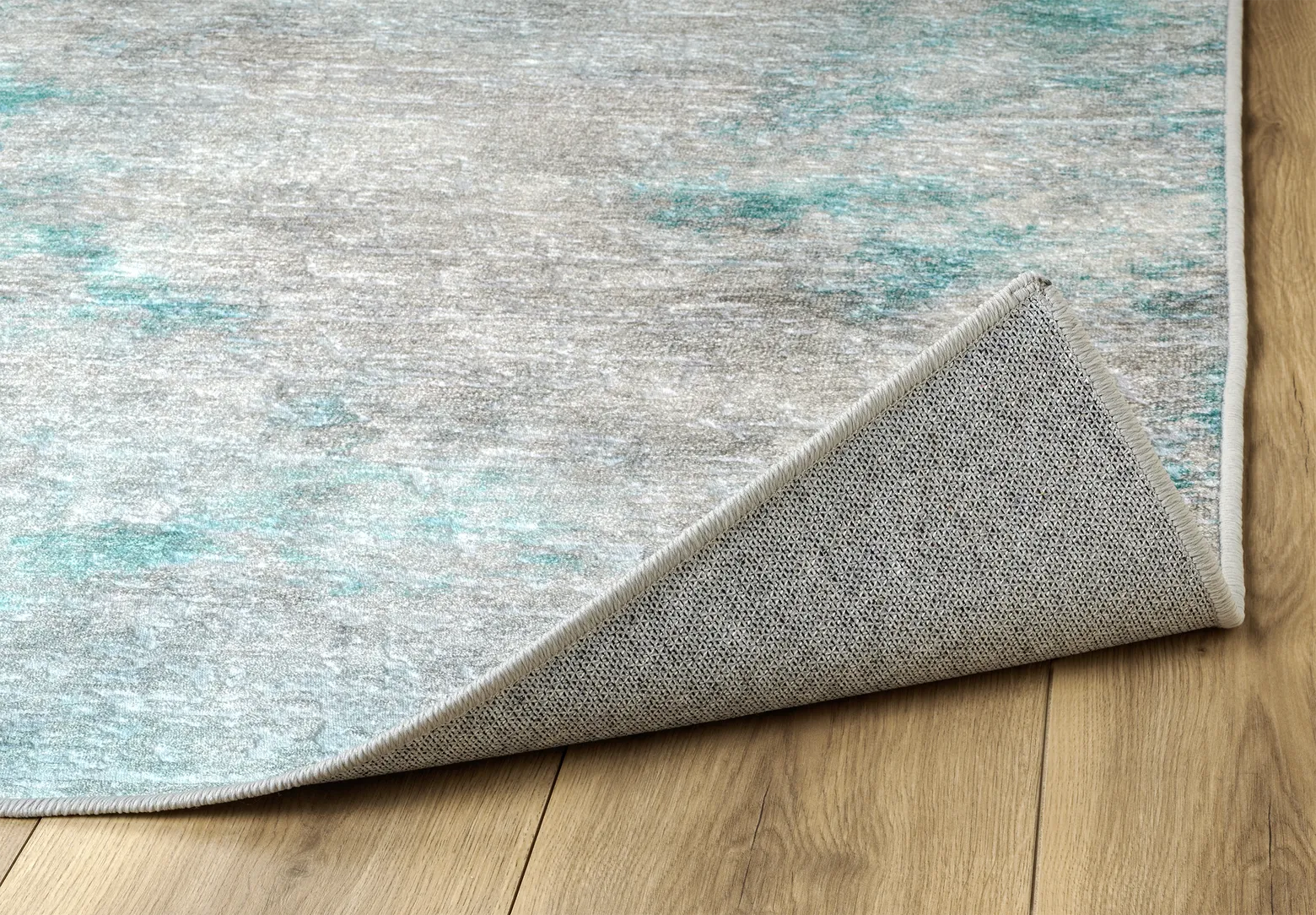 Angolo del tappeto Onis Turch bouclé 3D con bordo rifinito e retro antiscivolo.