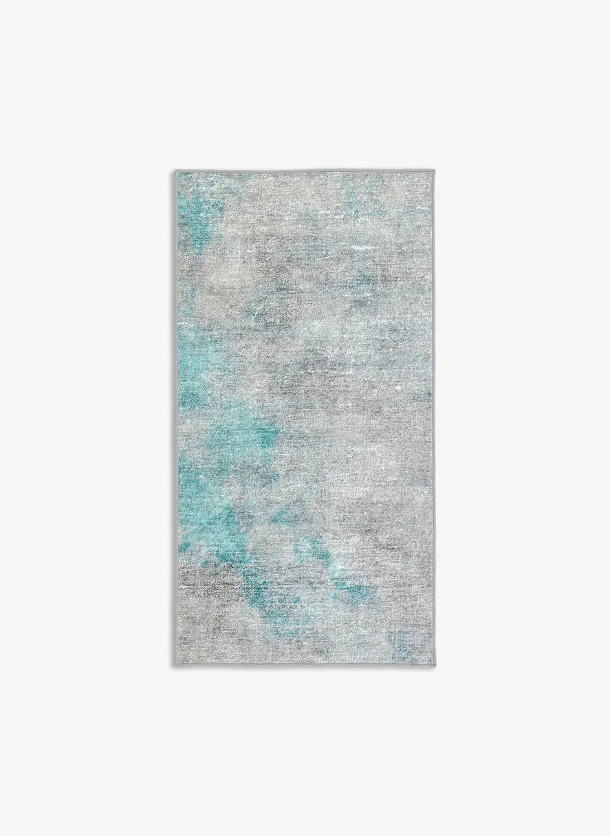 Tappeto Onis Turch bouclé 3D 80×150 cm con onde sabbia, grigio e azzurro visto dall’alto.