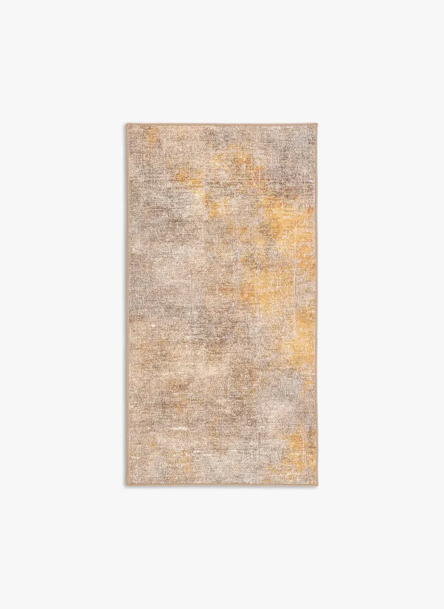 Tappeto Onis Gold bouclé 3D 80×150 cm con onde oro, sabbia e crema visto dall’alto.