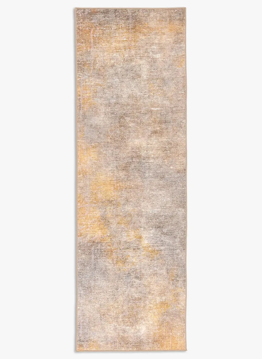 Tappeto Onis Gold bouclé 3D 80×250 cm con pattern ondulato oro e sabbia visto dall’alto.