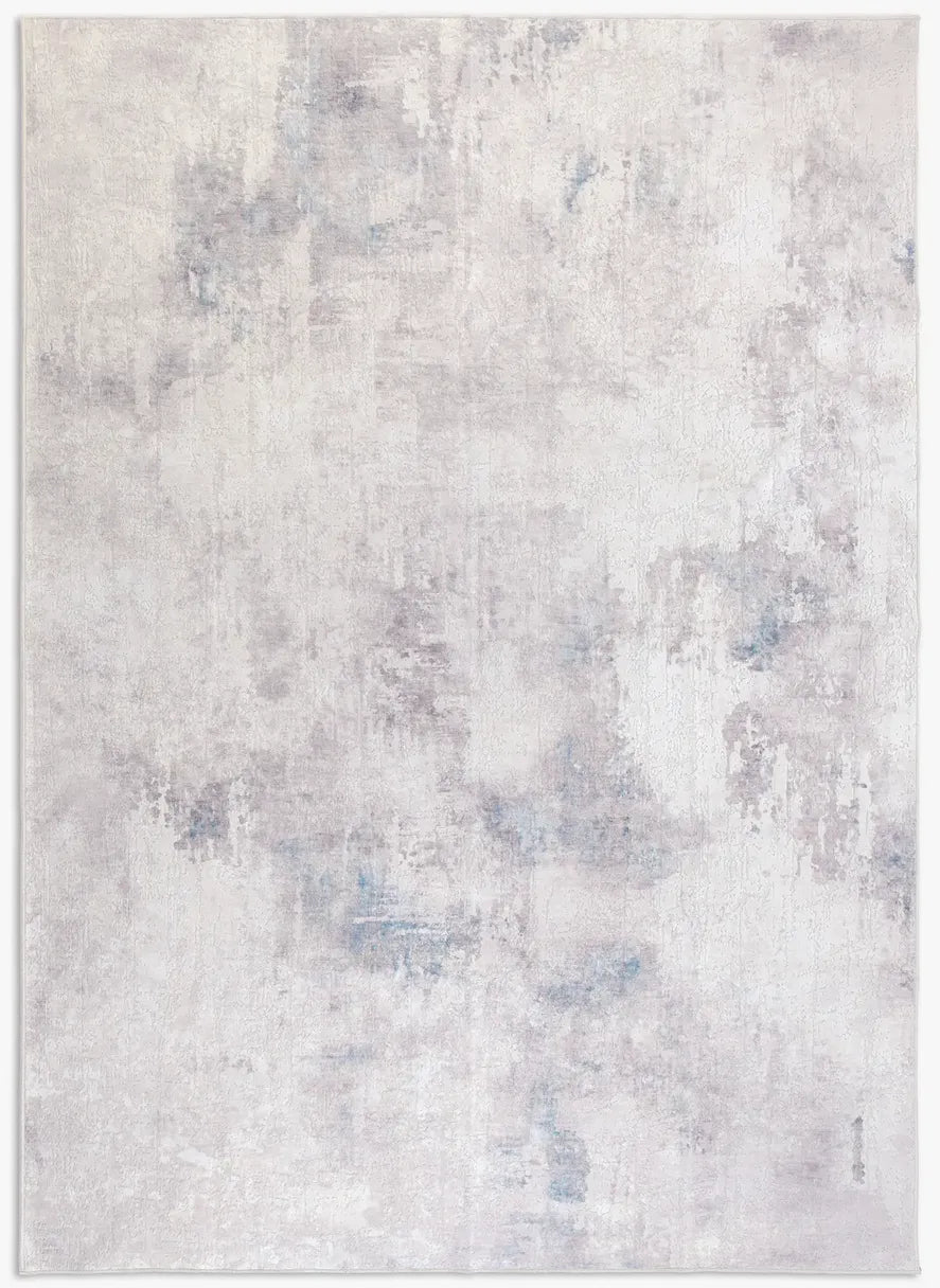 Tappeto Jorg PastBlue bouclé 3D 200×290 cm con riquadri sfumati azzurro polvere e grigio ghiaccio visto dall’alto.