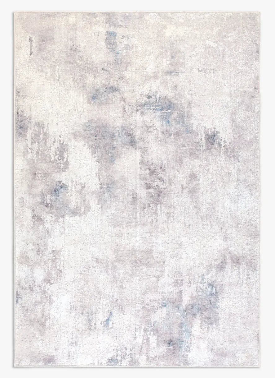 Tappeto Jorg PastBlue bouclé 3D 200×290 cm in soggiorno luminoso, palette fredda azzurro e avorio.