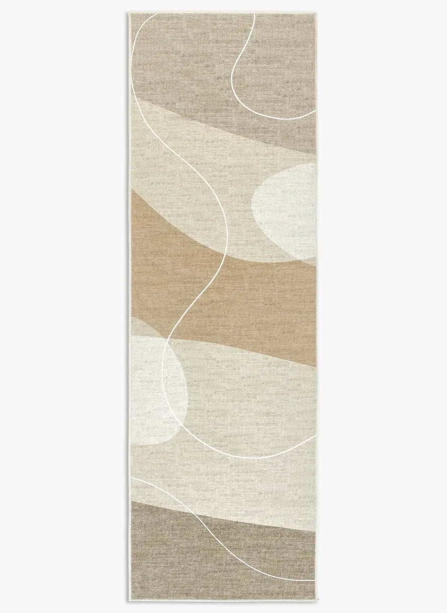 Tappeto Dunis 80x250 cm visto dall’alto, runner con onde beige e panna e linee bianche sottili.