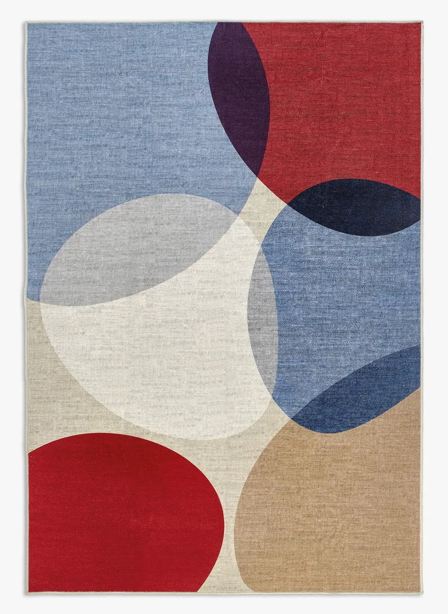 Tappeto Nayra 160x230 cm, ripresa dall’alto con pattern astratto multicolore.