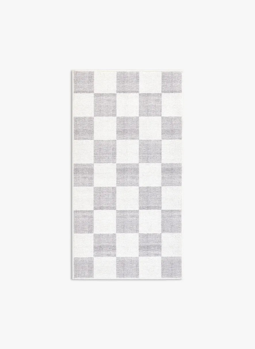 Tappeto Jack LtGrey 80×150 cm in pelo taftato, motivo a quadri piccoli grigio chiaro e panna visto dall’alto.