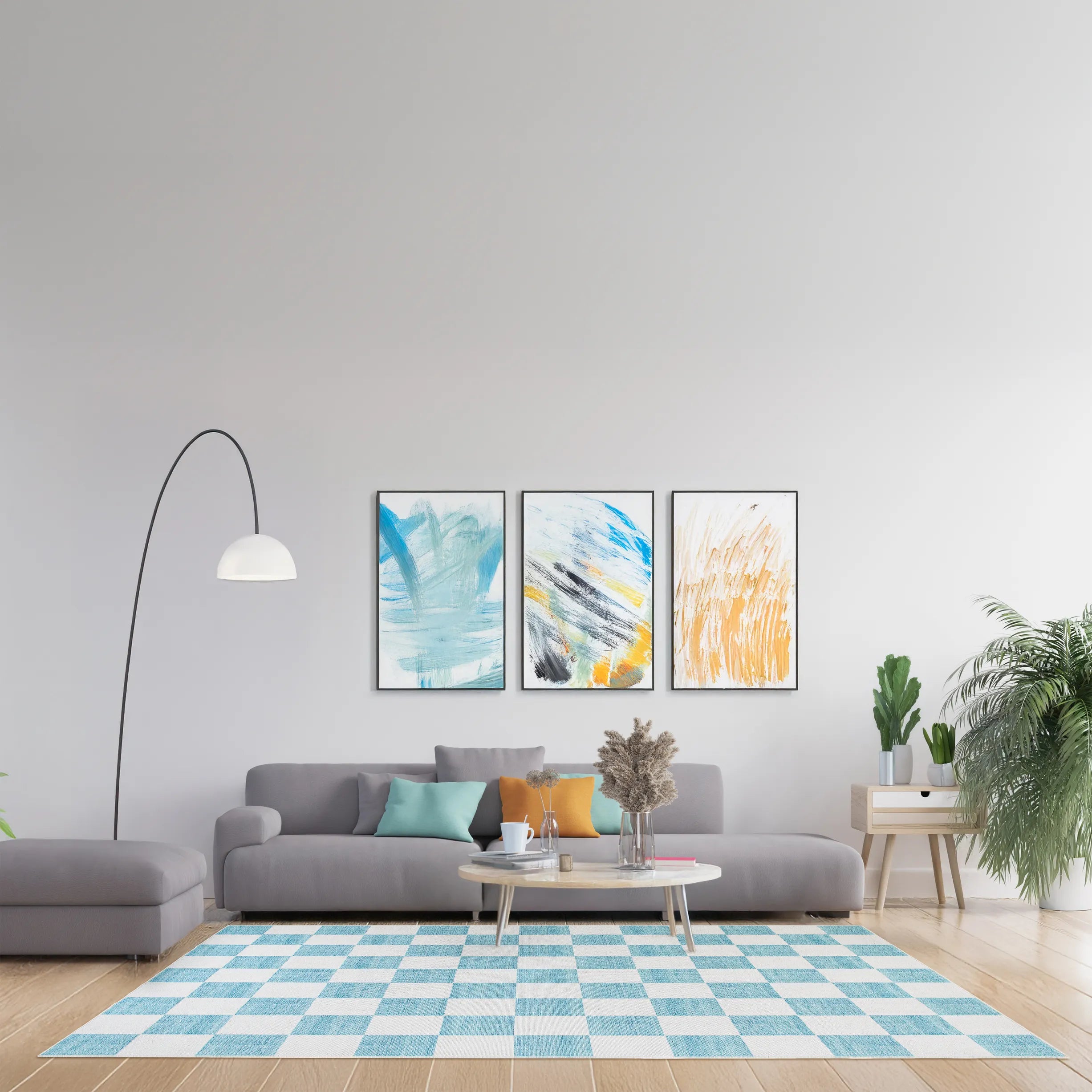 Tappeto Jack Mint 200×290 cm in soggiorno luminoso con grande finestra, poltrona verde, tavolino rotondo e piante decorative.