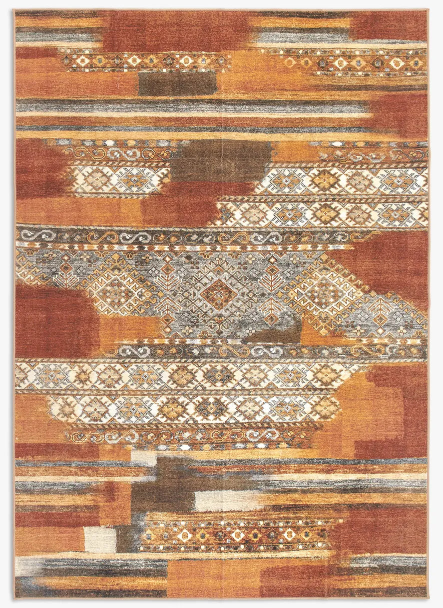 Tappeto Myfar 200x290 cm visto dall’alto, con dettagli etnici e ampie campiture di colore terracotta e ruggine.