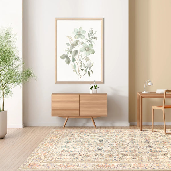 Tappeto Jane 160×230 cm in ambiente luminoso con madia in legno chiaro, grande quadro botanico, scrivania minimal e pareti nei toni neutri e sabbia.
