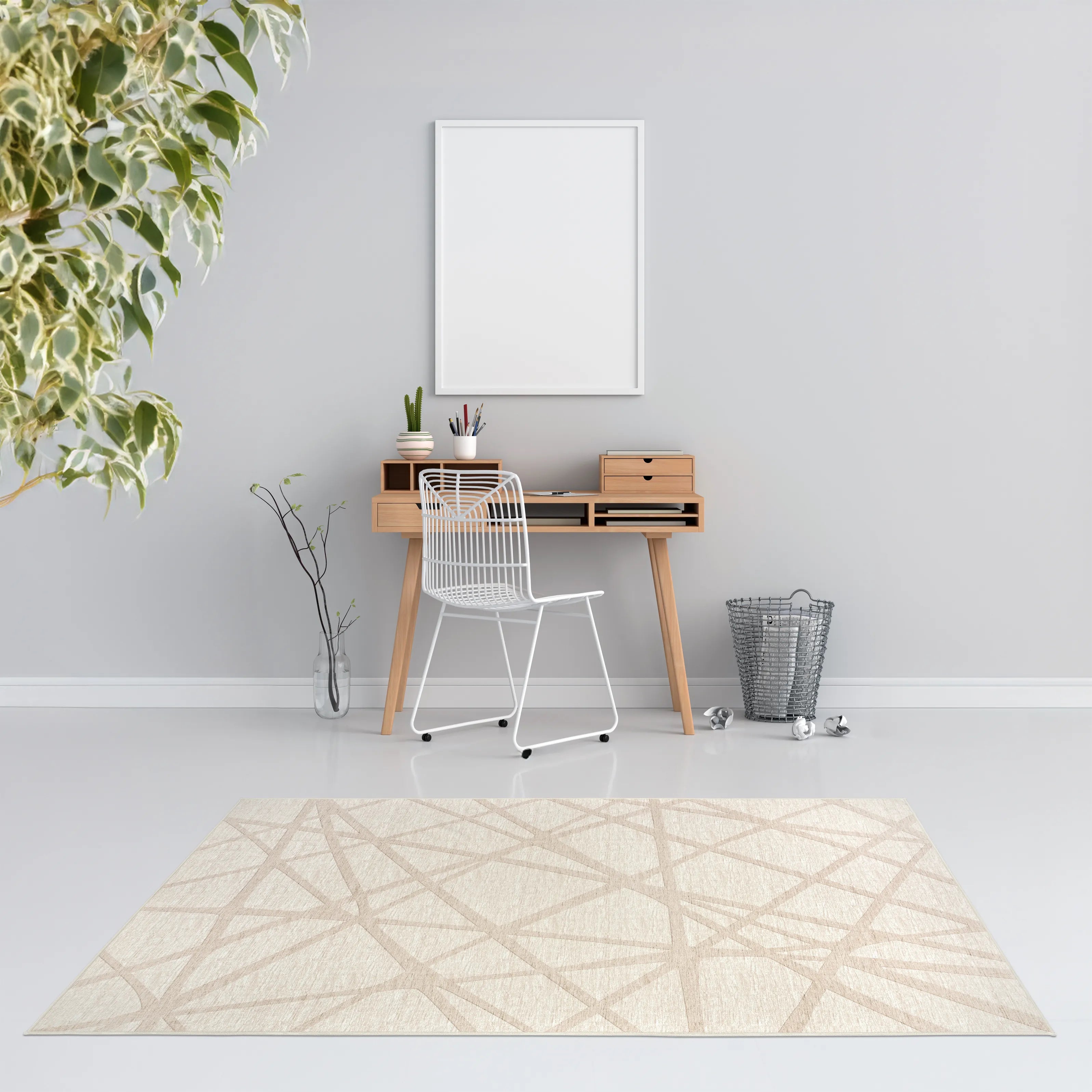 Tappeto Dome 130×190 cm in studio minimal con parete grigio chiaro, scrivania in legno, sedia wire bianca e cornice; lavabile a 40° in lavatrice e asciugabile in asciugatrice, antiscivolo e impermeabile.