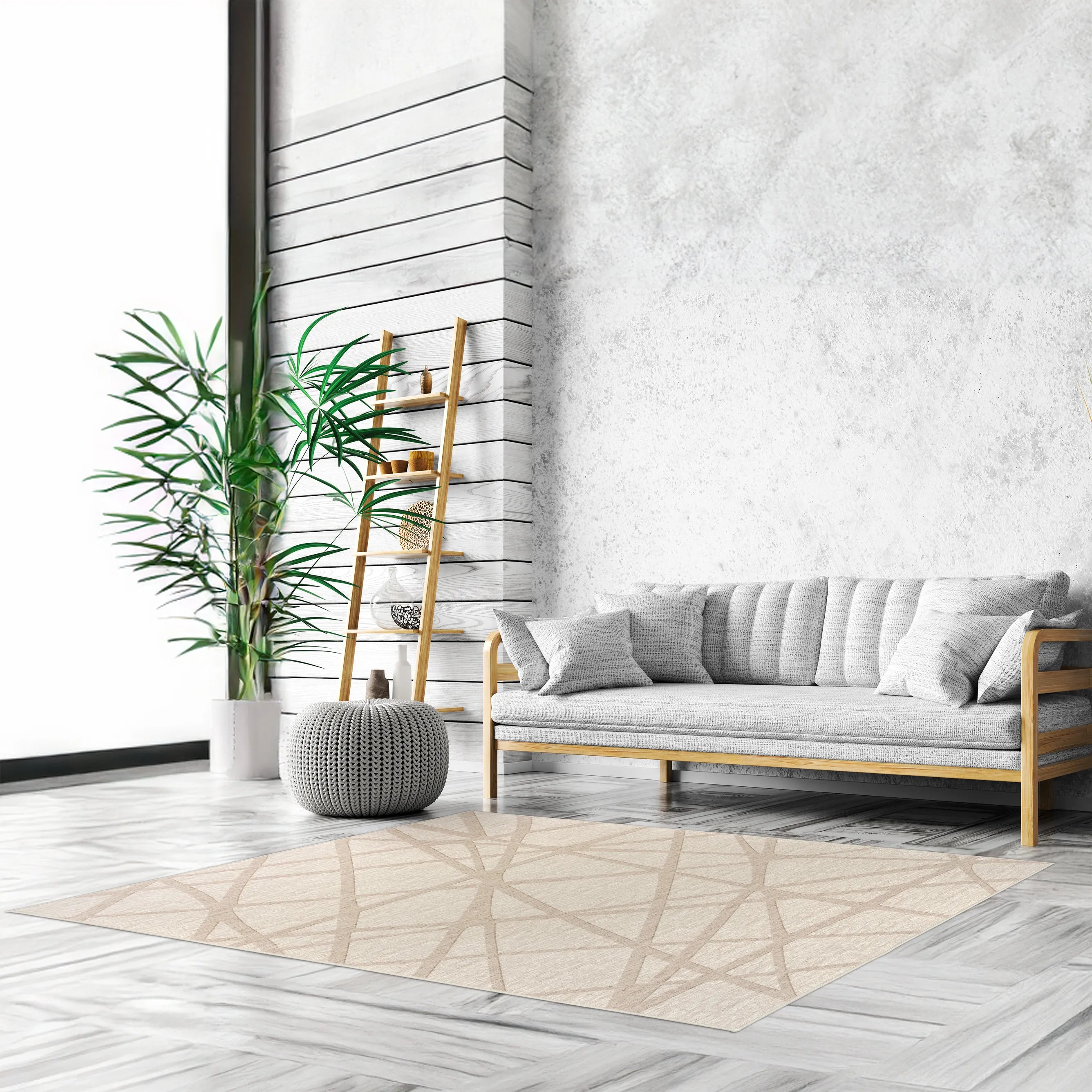 Tappeto Dome 160×230 cm in salotto nordico con divano in legno e cuscini grigi, parete a doghe bianche, scala portaoggetti e pouf lavorato; lavabile a 40° in lavatrice e asciugabile in asciugatrice, antiscivolo e impermeabile.