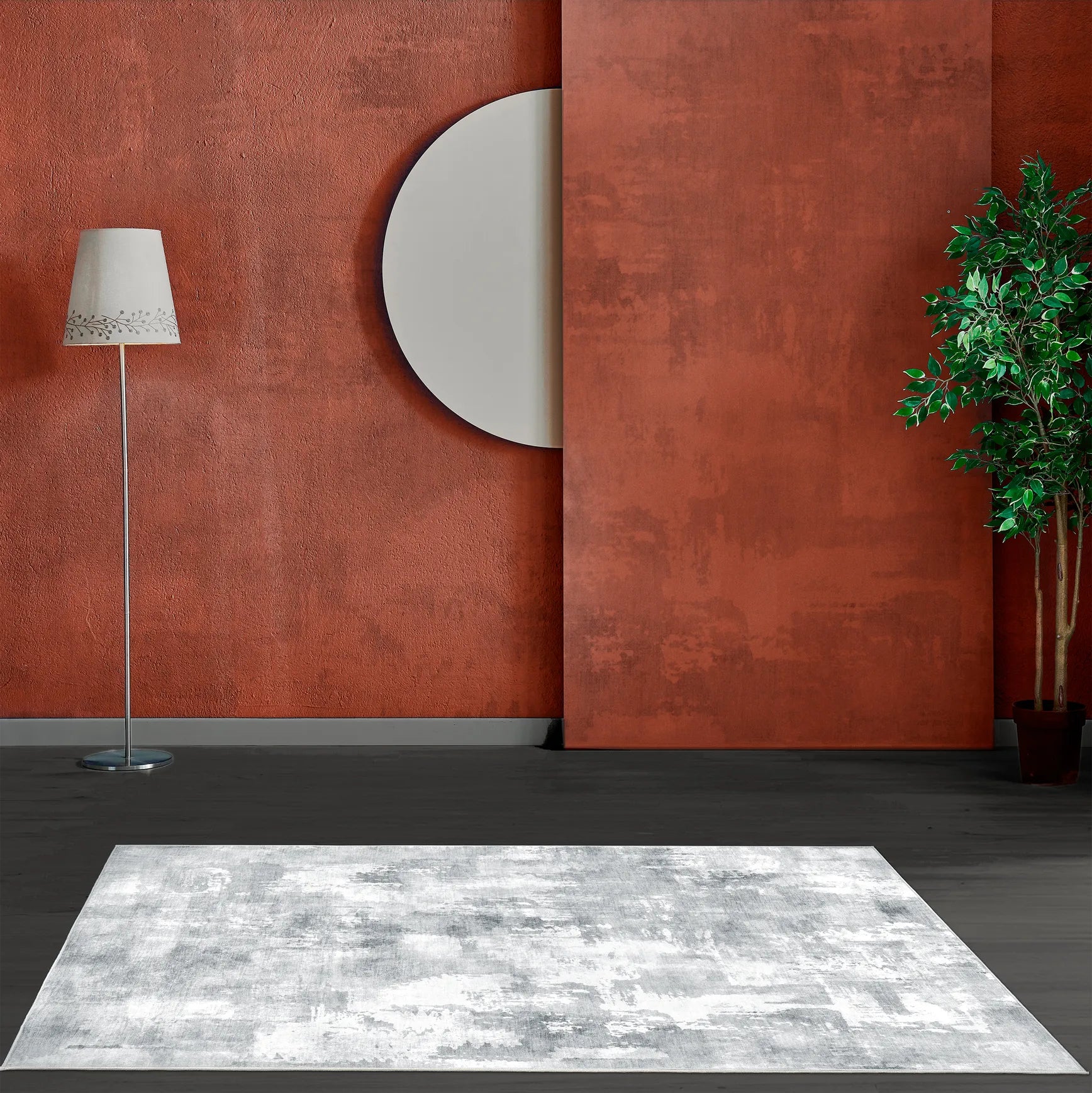 Tappeto Elio 160×230 cm grigio astratto davanti a parete terracotta con specchio; lavabile in lavatrice e asciugabile in asciugatrice.