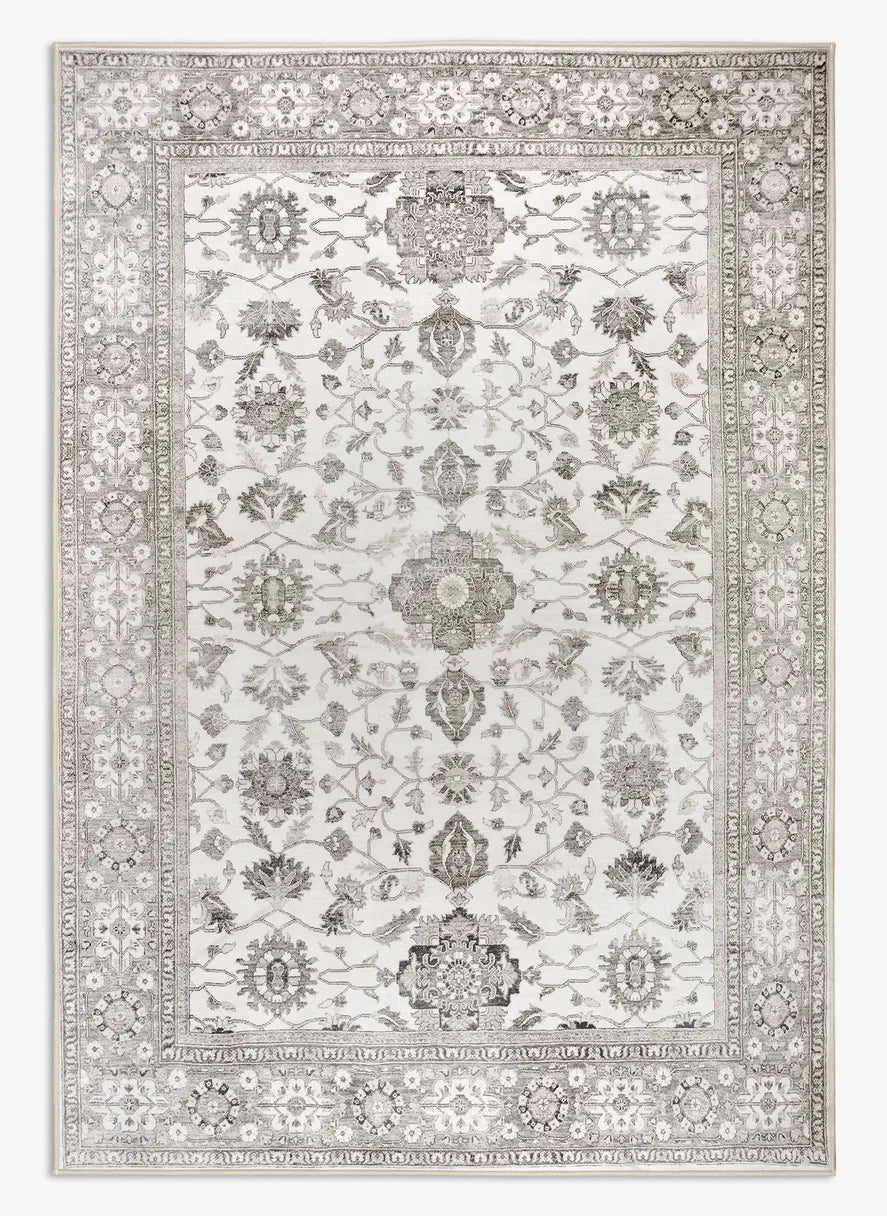 Tappeto Farah 160×230 cm con disegno floreale ispirato ai tappeti persiani in tonalità avorio, beige e grigio; lavabile in lavatrice a 40° e asciugabile in asciugatrice, antimacchia, antiscivolo e impermeabile.